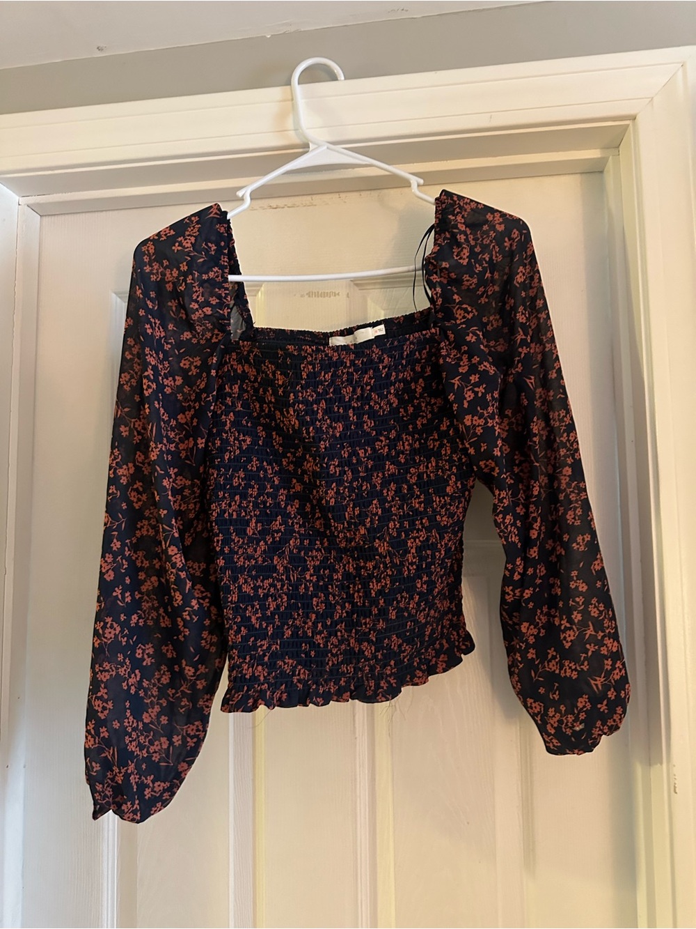 Lush Navy Smocked Floral Blouse with Rust Print